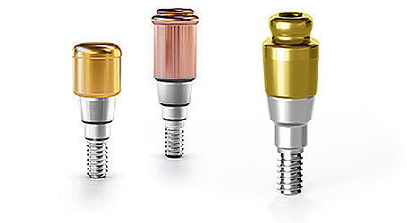 ODSecure® abutment on the right and two Locator® abutments on the left, for the iSy implant system.